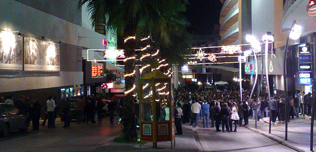 Evacuated people outside Eden Cinemas on Bay street